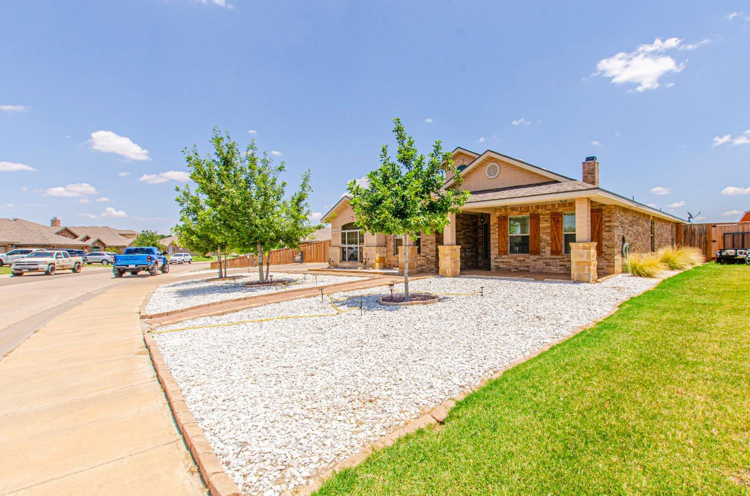 9105 Rochester Avenue Lubbock, TX 79424 - Photo 15 of 24 a view of a house with a swimming pool