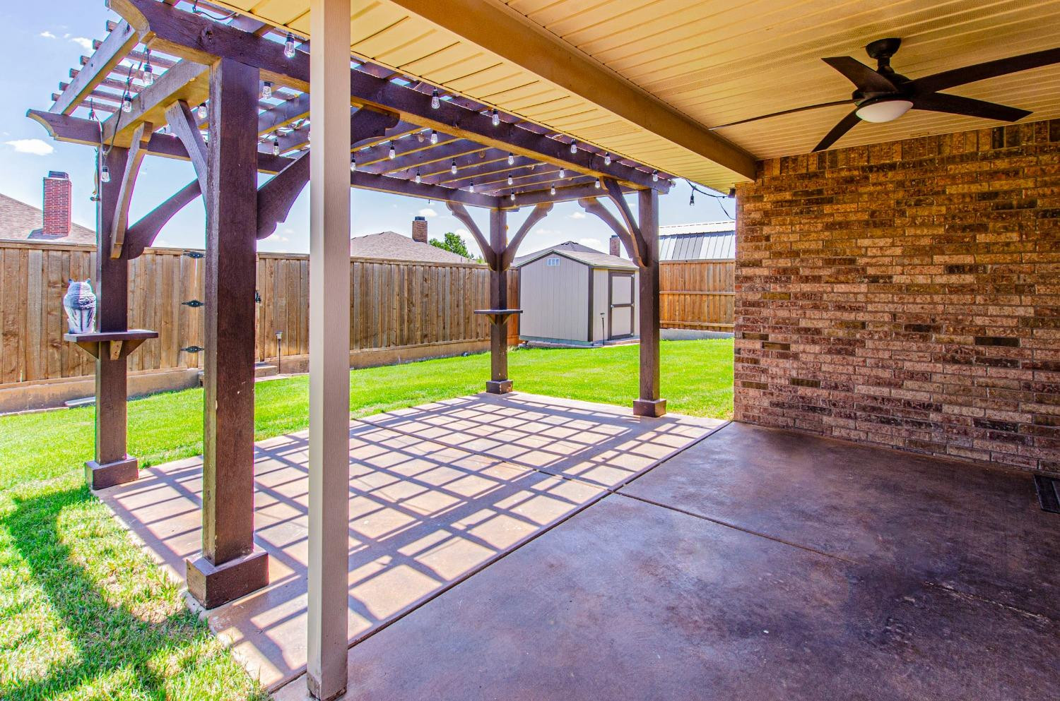 9105 Rochester Avenue Lubbock, TX 79424 - Photo 16 of 24 a view of a pathway with a small yard