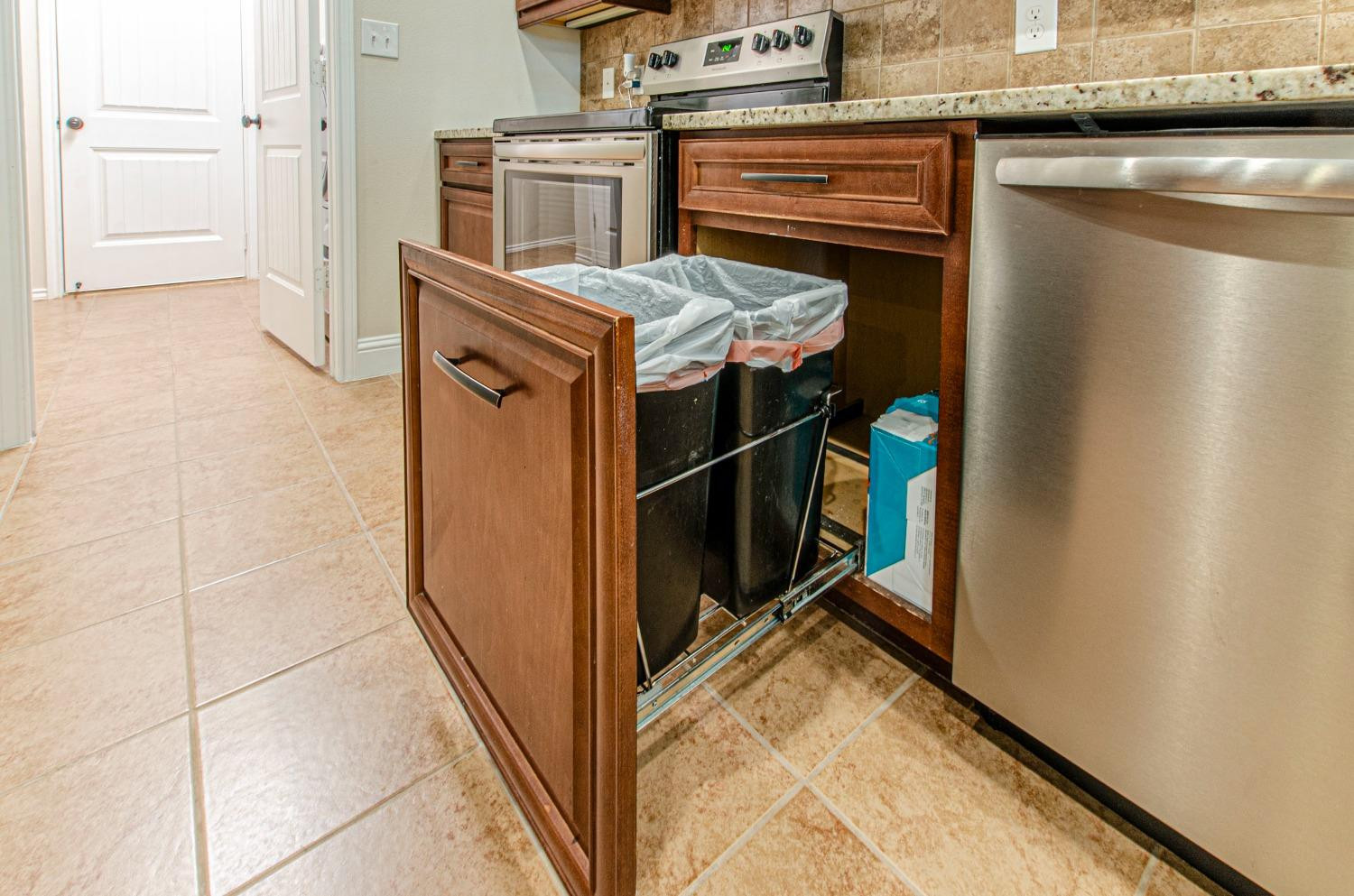 9105 Rochester Avenue Lubbock, TX 79424 - Photo 23 of 24 a utility room with washer and dryer