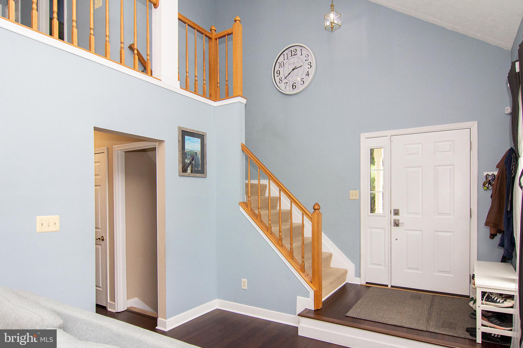 1827 Beth Bridge Circle Forest Hill, MD 21050 - Photo 19 of 48 a view of a hallway with entryway wooden floor and front door