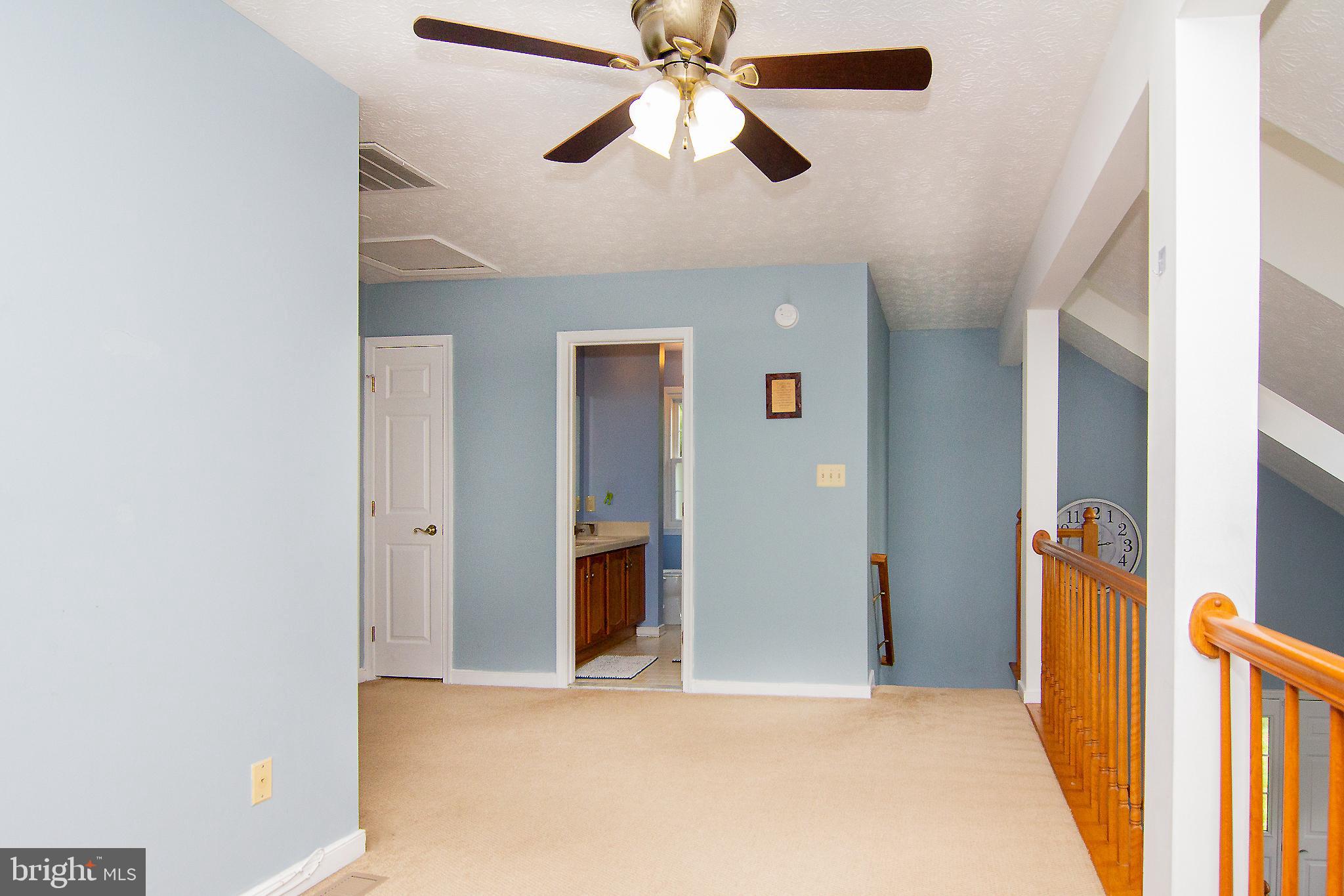 1827 Beth Bridge Circle Forest Hill, MD 21050 - Photo 21 of 48 a view of a hallway with a chandelier fan