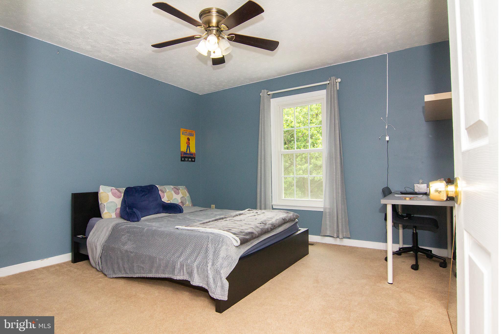 1827 Beth Bridge Circle Forest Hill, MD 21050 - Photo 25 of 48 a bedroom with a bed and a chandelier