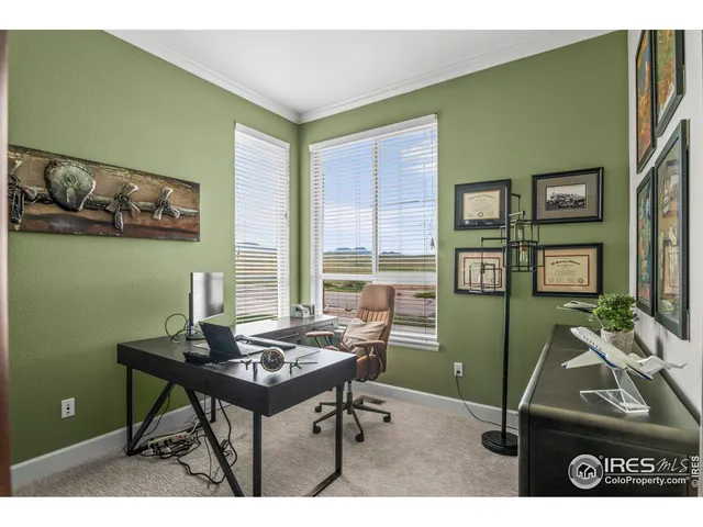 a room with furniture and a window