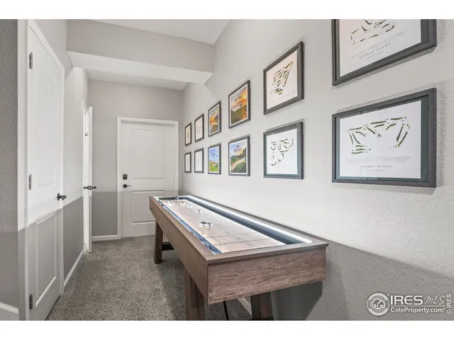 a kitchen view of a refrigerator stove and a sink