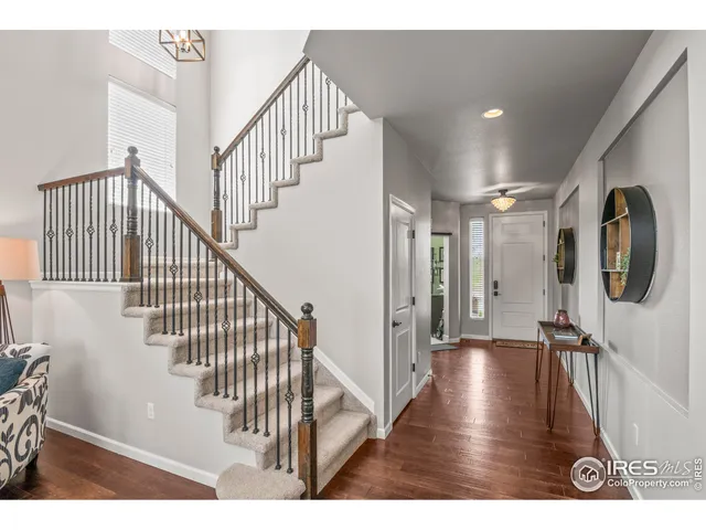 a view of entryway with wooden floor