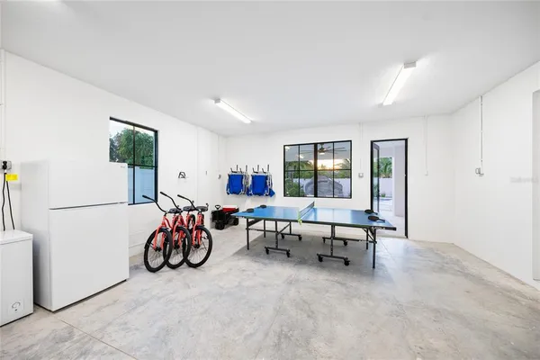 a view of a livingroom with furniture and a window