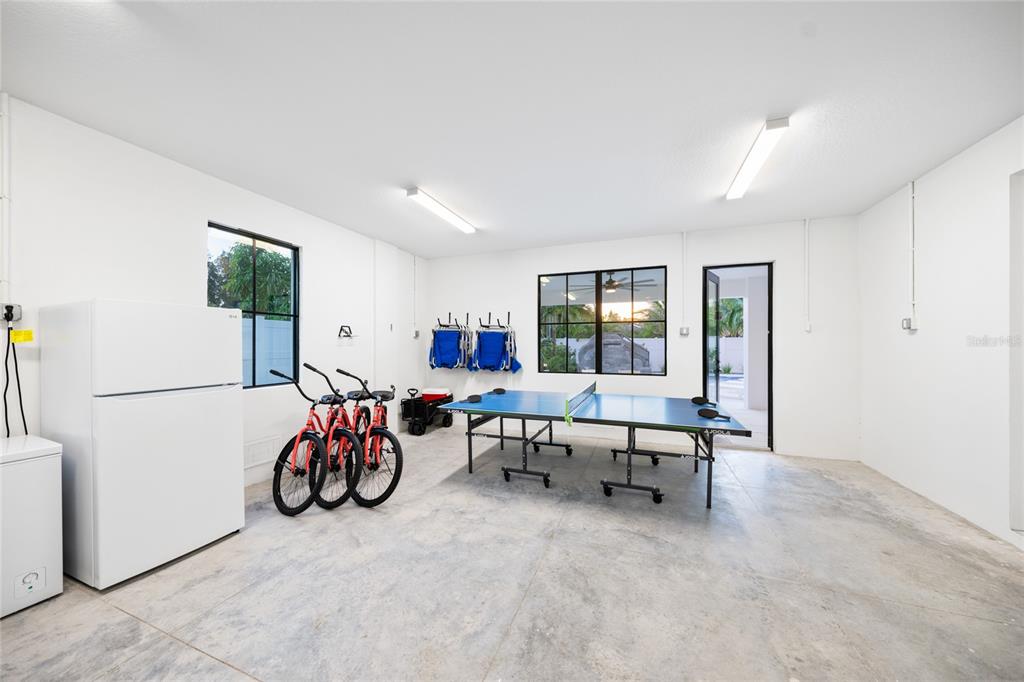 6910 Midnight Pass Road, Unit A Sarasota, FL 34242 - Photo 32 of 40 a view of a livingroom with furniture and a window
