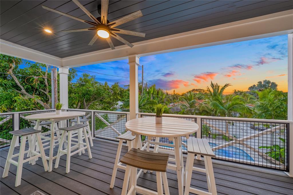 6910 Midnight Pass Road, Unit A Sarasota, FL 34242 - Photo 38 of 40 a view of an outdoor sitting area with a table