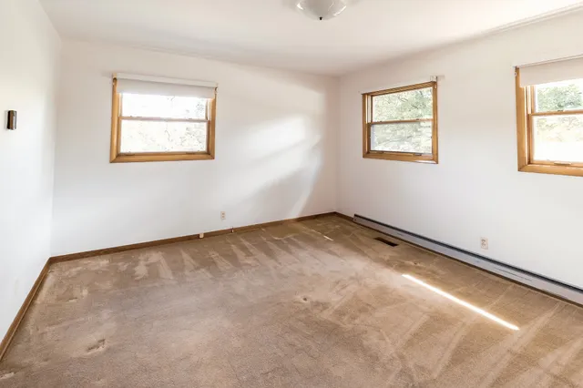 a view of a room with a window