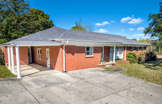 a front view of a house with a porch