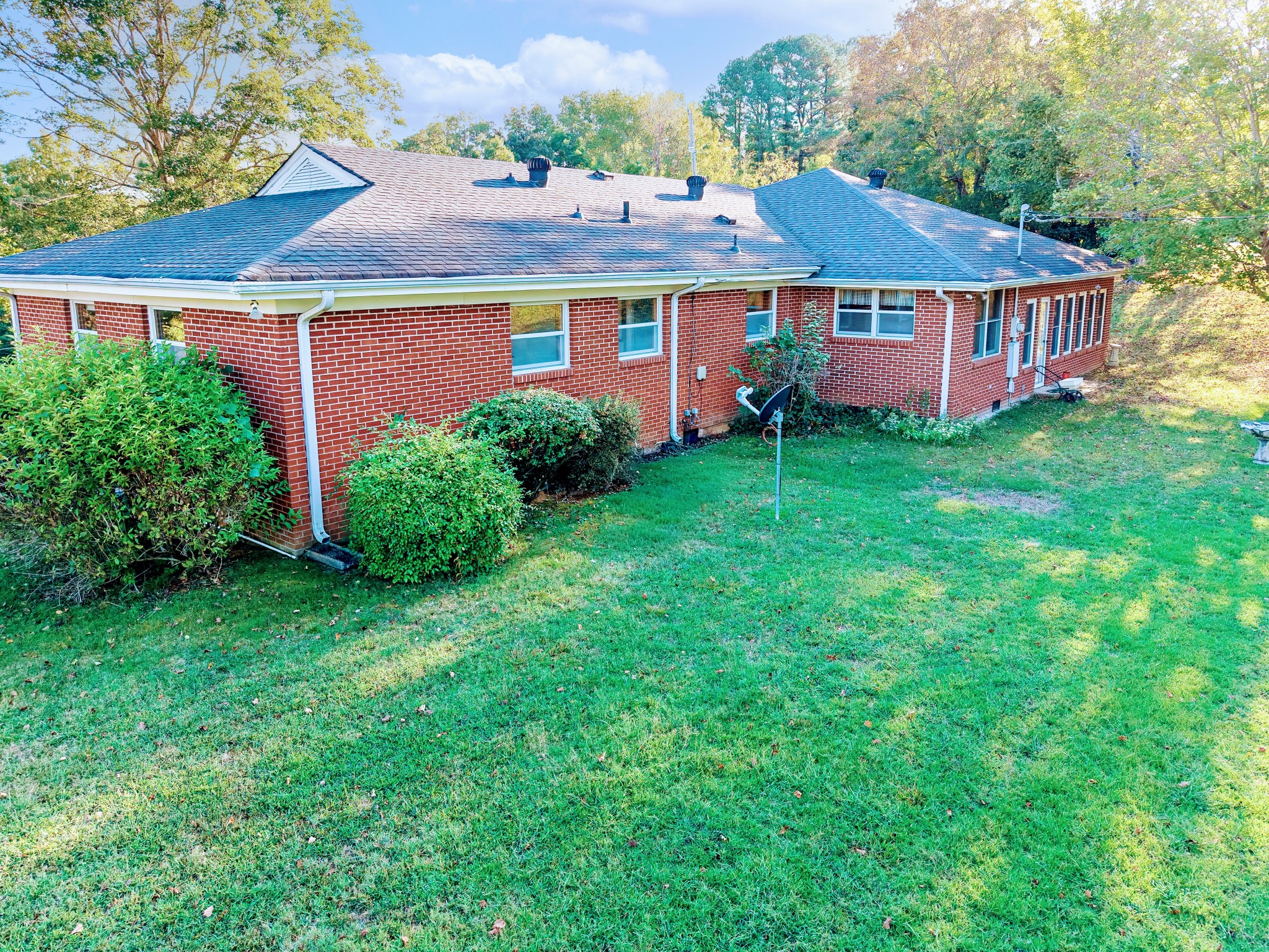 3241 West Main Street Erin, TN 37061 - Photo 5 of 22 a view of a yard in front of a house