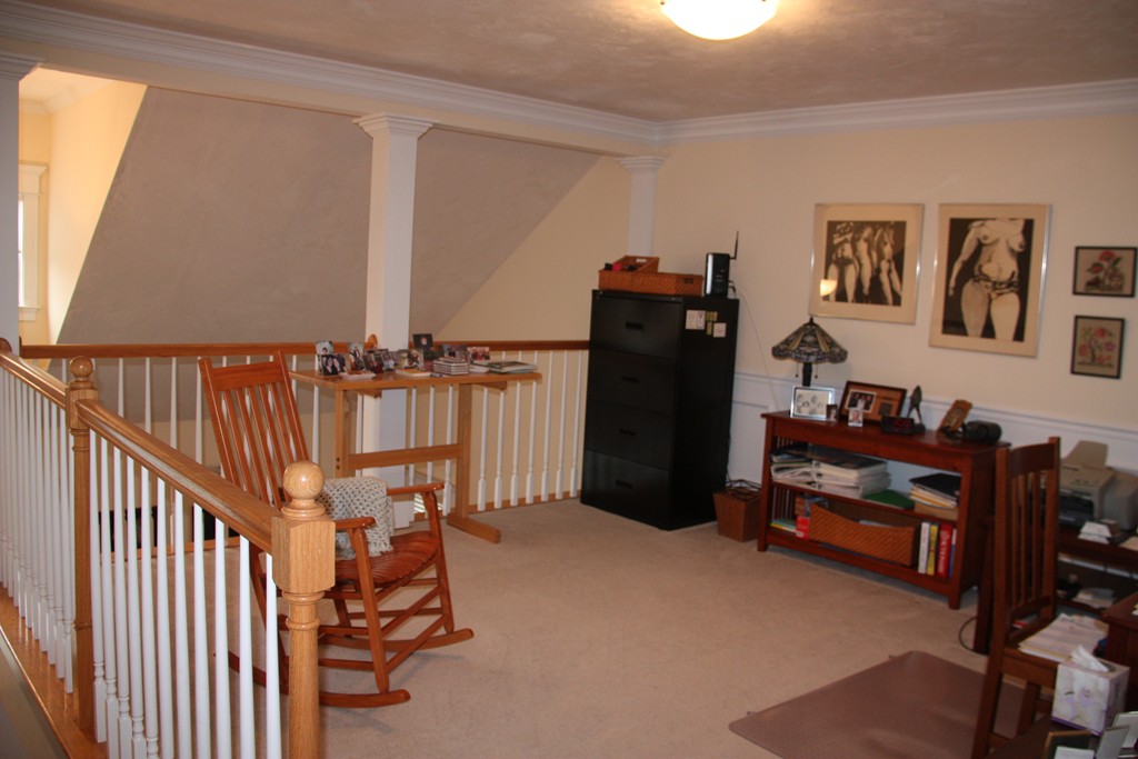 3 Ellsworth Village Road, Unit 2 Acton, MA 01720 - Photo 17 of 25 a view of a workspace with furniture and toys