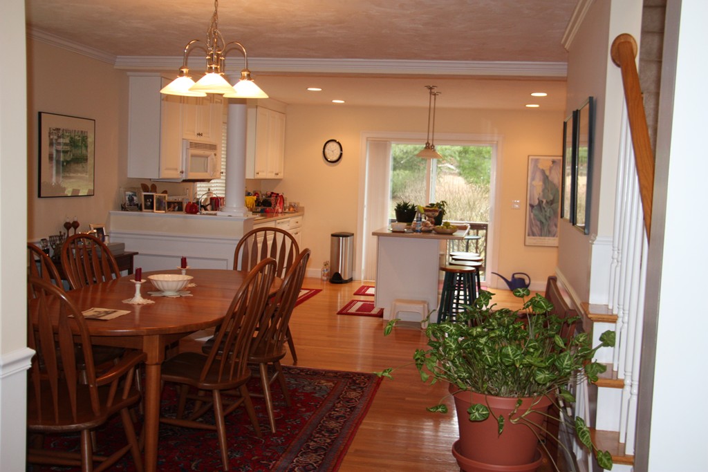 3 Ellsworth Village Road, Unit 2 Acton, MA 01720 - Photo 7 of 25 a view of a dining room with furniture window and outside view