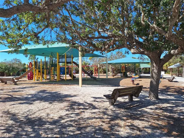 a view of a chairs and tables in the patio