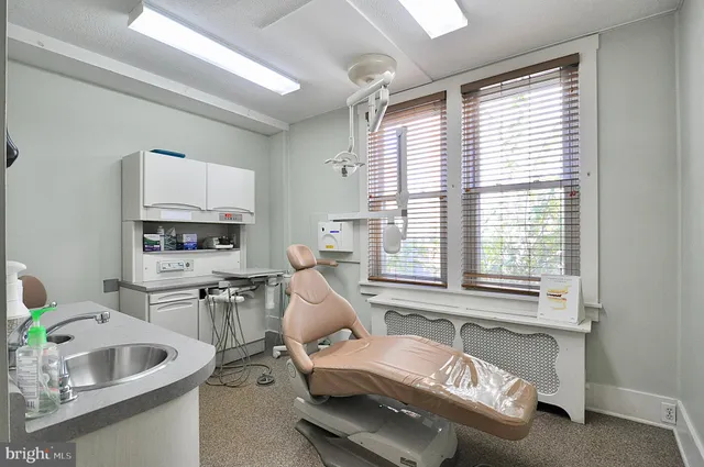 a room with furniture and window