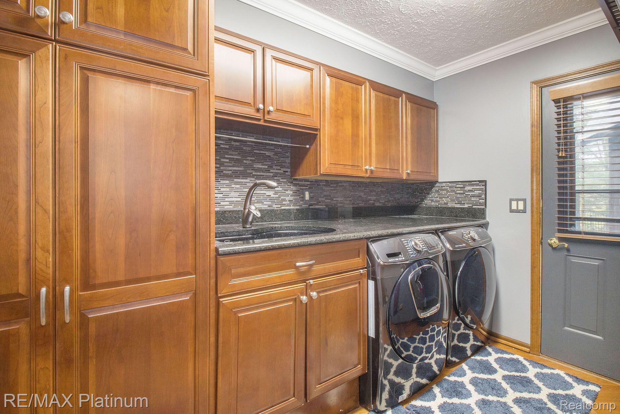 100 North Latson Road Howell, MI 48843 - Photo 17 of 27 First Floor Laundry