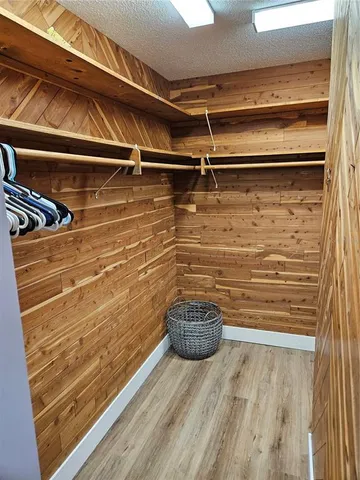 a view of entryway with wooden floor