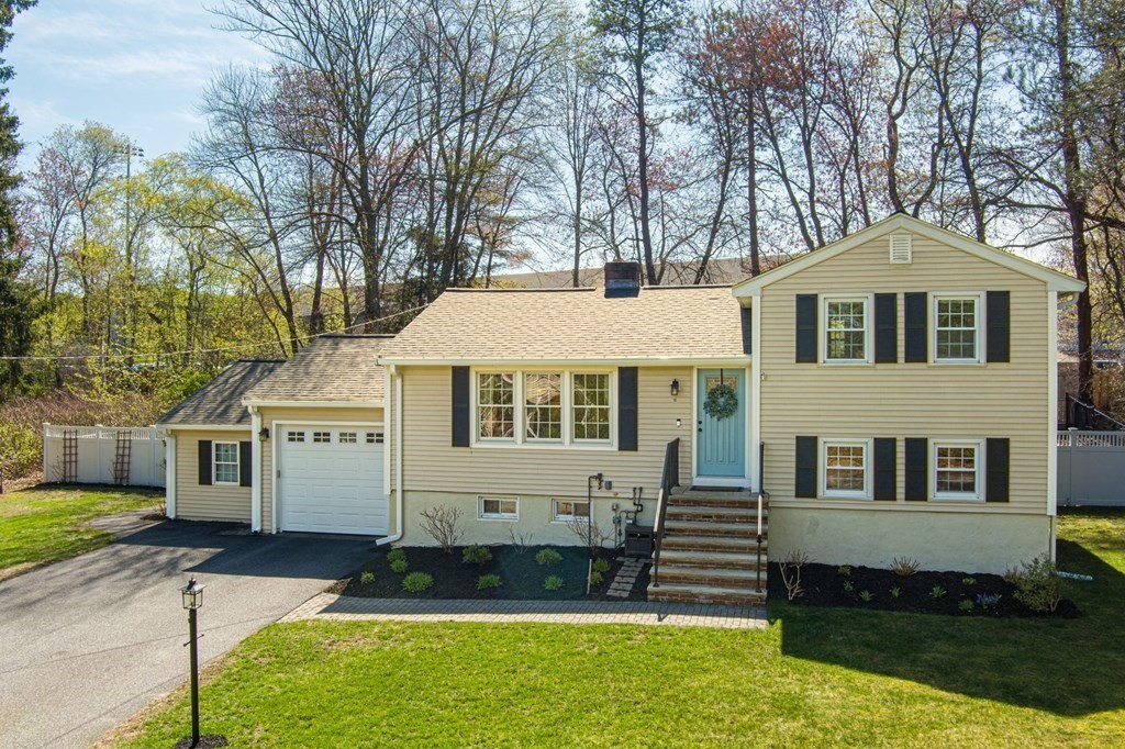 18 Corcoran Road Billerica, MA 01821 - Photo 1 of 40 a front view of a house with a yard
