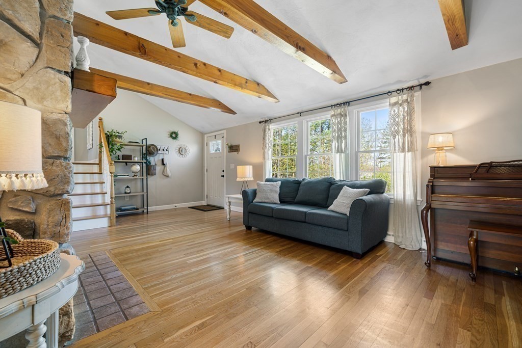 18 Corcoran Road Billerica, MA 01821 - Photo 11 of 40 a living room with furniture and wooden floor