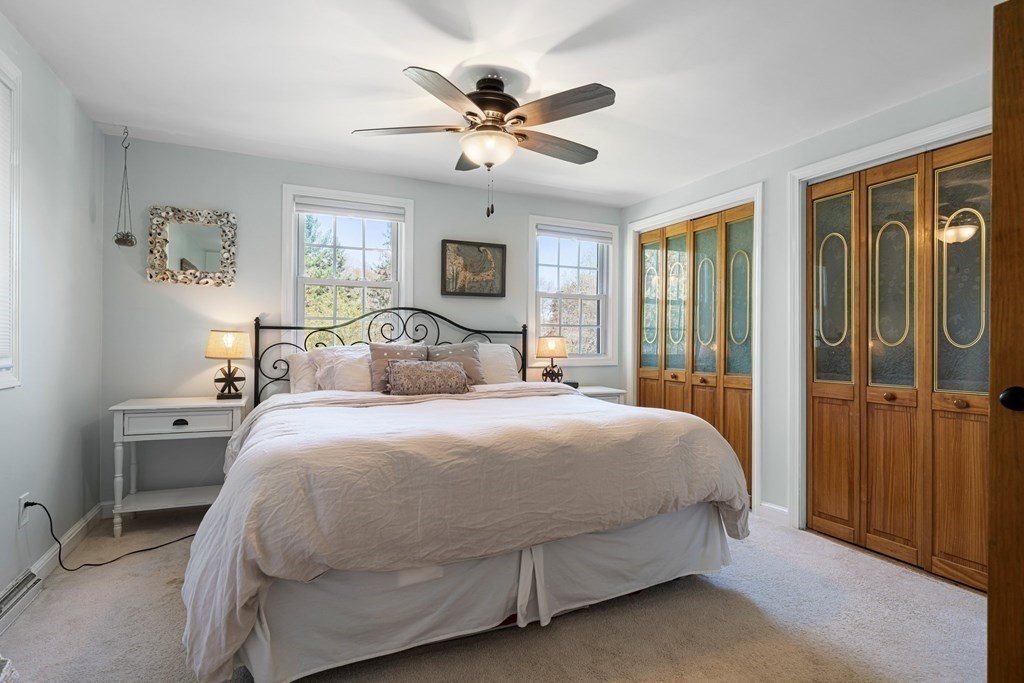 18 Corcoran Road Billerica, MA 01821 - Photo 23 of 40 a bedroom with a bed and window