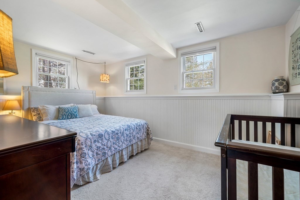 18 Corcoran Road Billerica, MA 01821 - Photo 32 of 40 a bedroom with a bed and a window