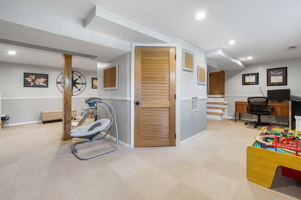 18 Corcoran Road Billerica, MA 01821 - Photo 40 of 40 a view of a room with gym equipment