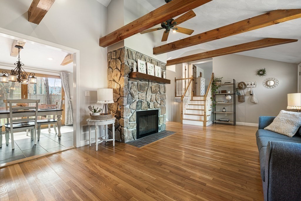 18 Corcoran Road Billerica, MA 01821 - Photo 9 of 40 a view of a livingroom with furniture and a fireplace