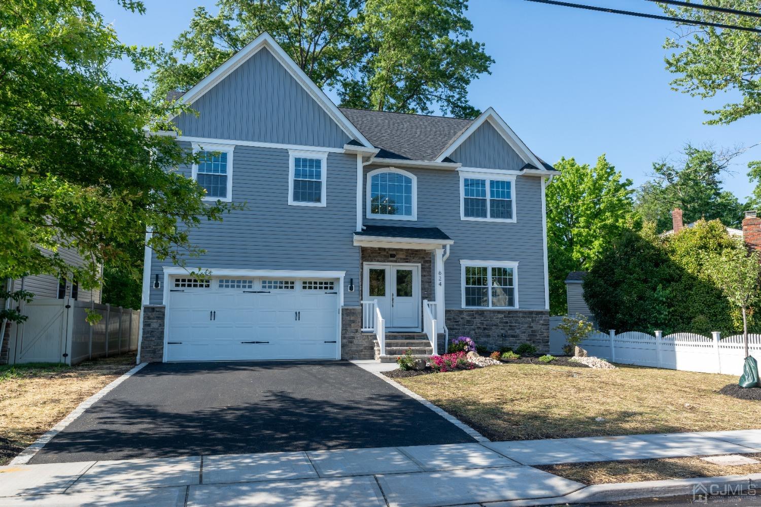 624 New Dover Road Colonia, NJ 07067 - Photo 1 of 29 a view of a house with a yard