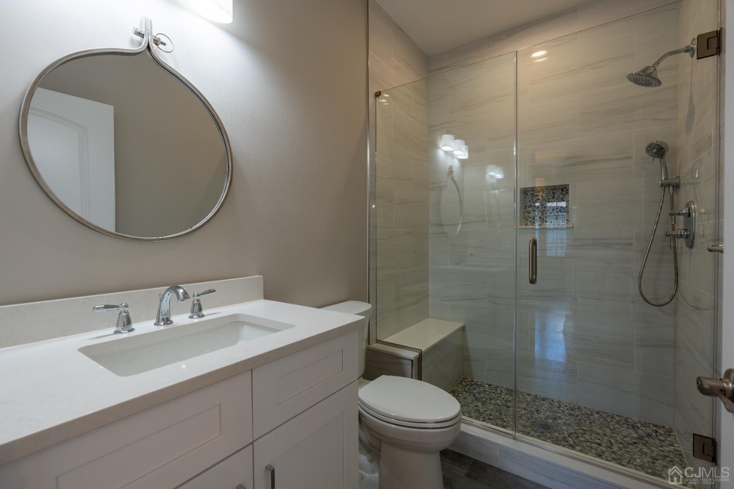 624 New Dover Road Colonia, NJ 07067 - Photo 12 of 29 a bathroom with a sink toilet and shower