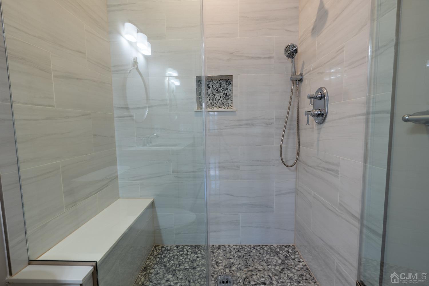 624 New Dover Road Colonia, NJ 07067 - Photo 13 of 29 a bathroom with a shower