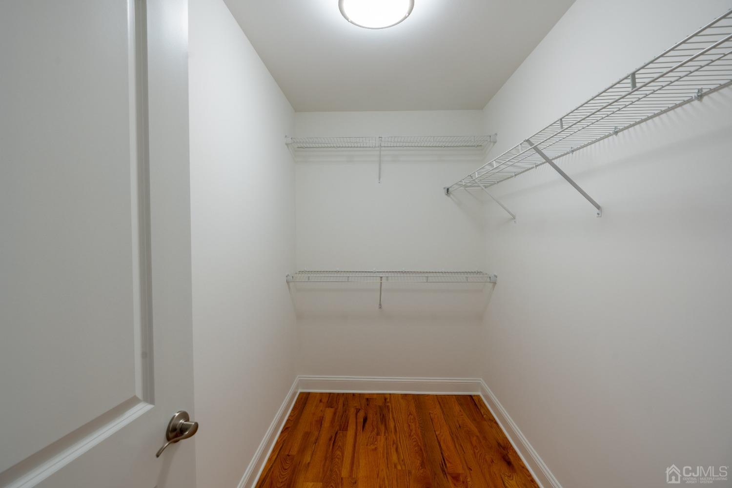 624 New Dover Road Colonia, NJ 07067 - Photo 23 of 29 a view of a room with racks on the wall