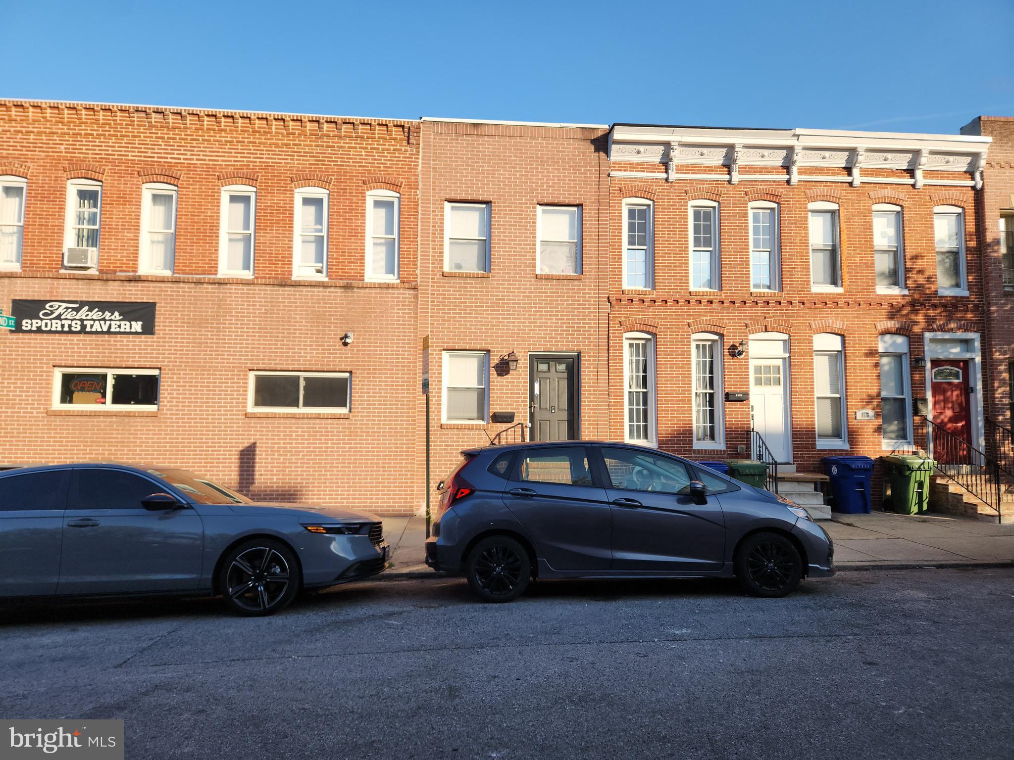1182 Nanticoke Street Baltimore, MD 21230 - Photo 3 of 26 a car parked in front of a building