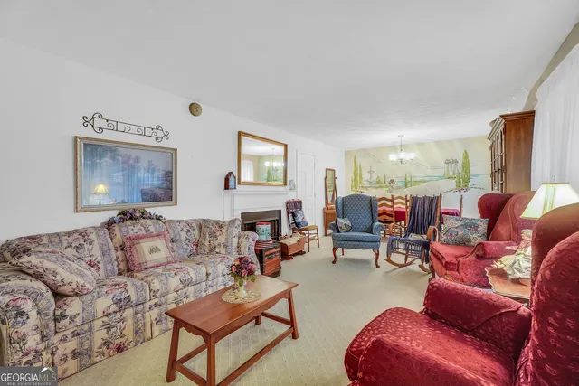 a bedroom with a bed and furniture