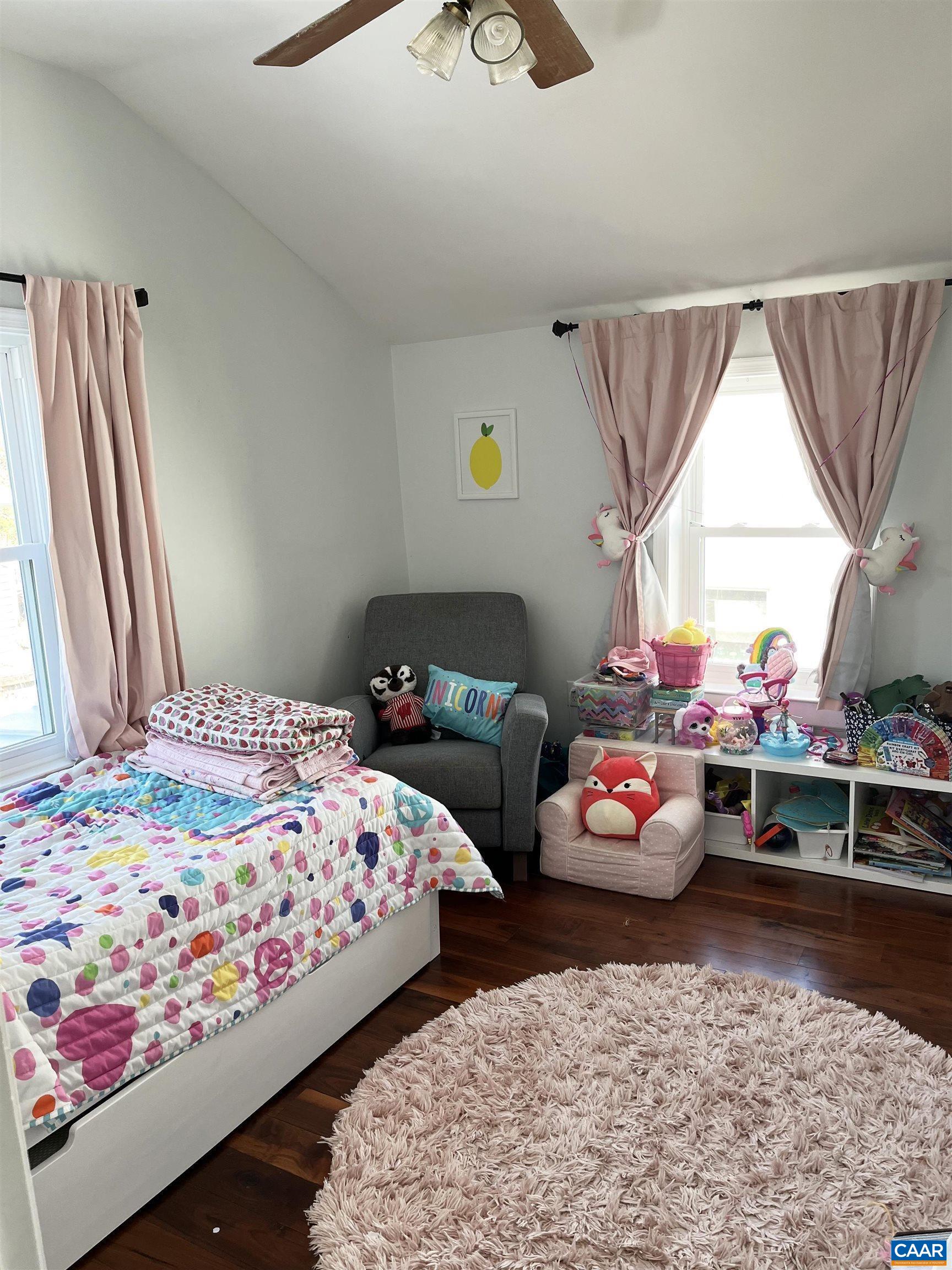 211 5th Street Northwest Charlottesville, VA 22903 - Photo 11 of 15 a bedroom with bed and window