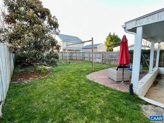 a view of a backyard with a garden