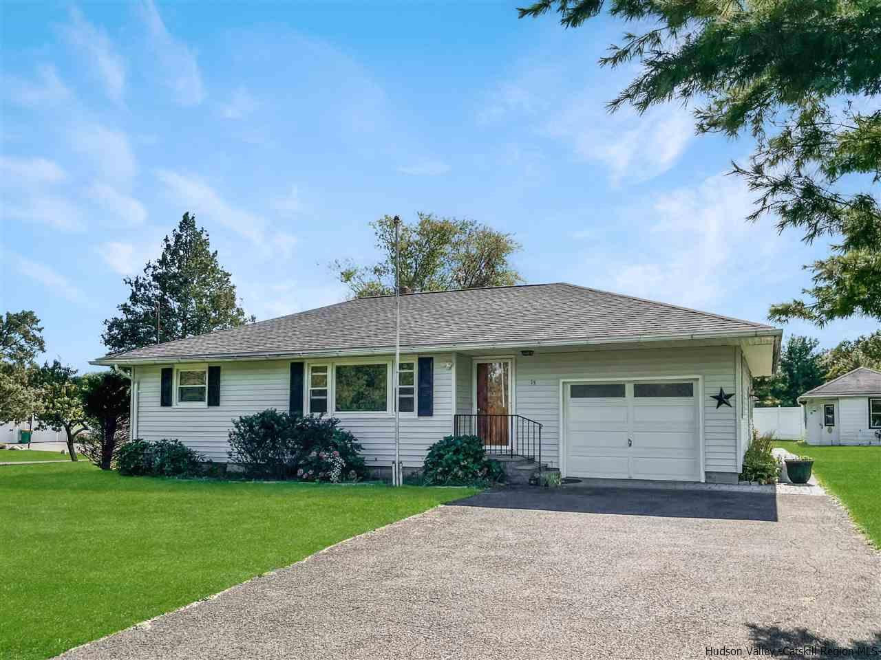 15 Old Lasher Road Saugerties, NY 12477 - Photo 1 of 18 a front view of a house with a yard and garage