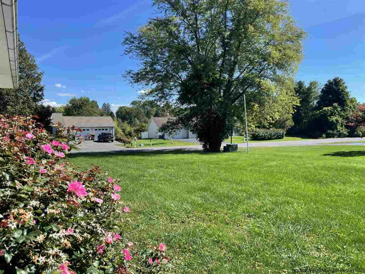 15 Old Lasher Road Saugerties, NY 12477 - Photo 13 of 18 a view of yard with flowers and trees