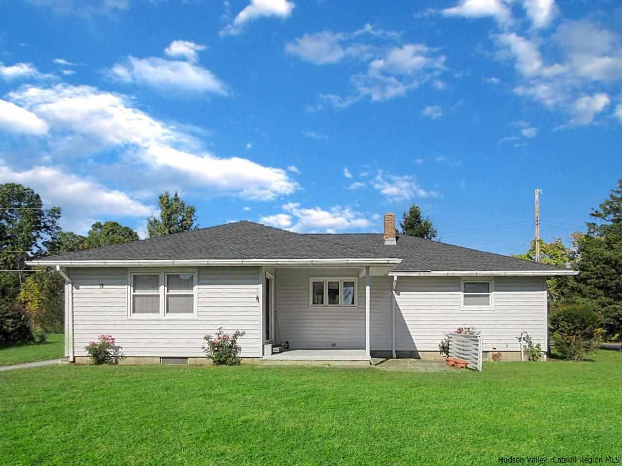 15 Old Lasher Road Saugerties, NY 12477 - Photo 16 of 18 a front view of a house with a yard and garage