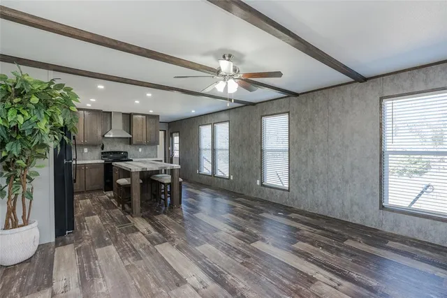 a view of a kitchen and dining room