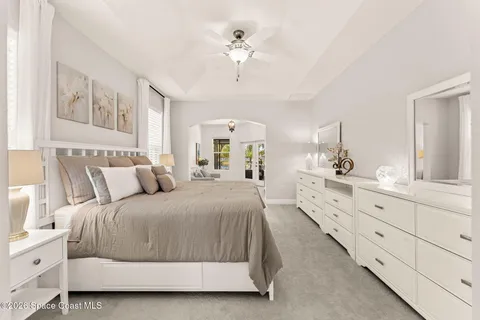 a living room with furniture white walls and white walls