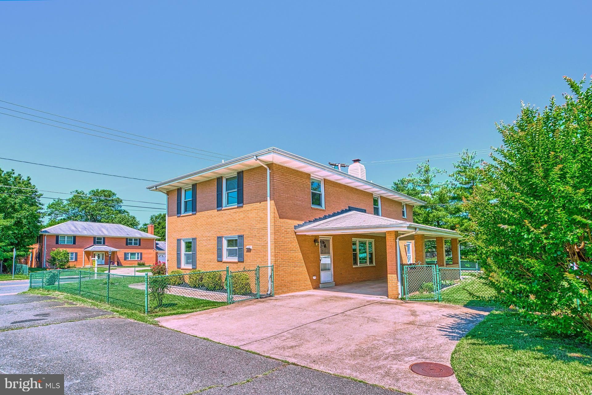 7719 Fordson Road Alexandria, VA 22306 - Photo 29 of 40 Driveway and carport. Situated on private drive