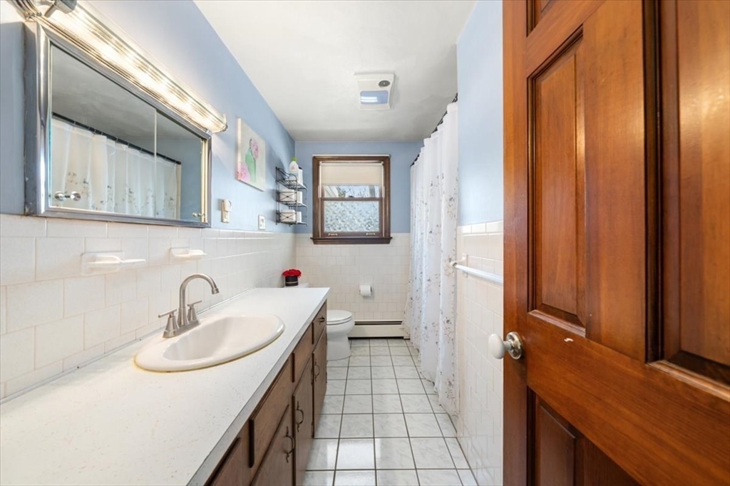 25 Pine Ridge Drive Ayer, MA 01432 - Photo 23 of 38 a bathroom with a sink and a mirror