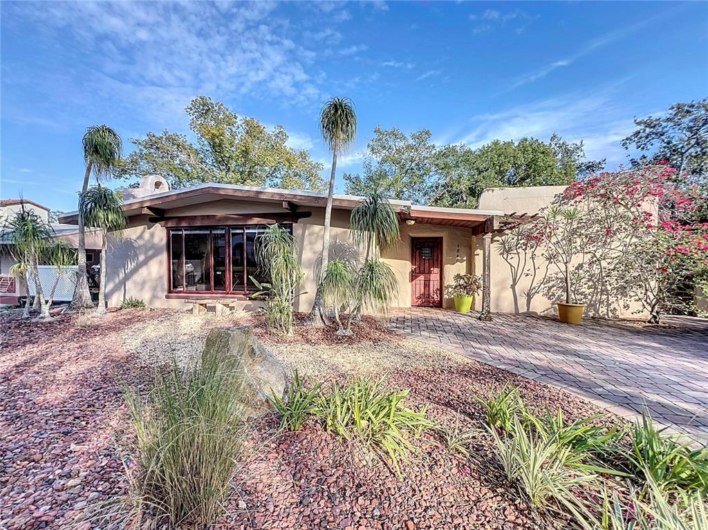 1840 Laurel Road Winter Park, FL 32789 - Photo 1 of 1 a front view of a house with garden