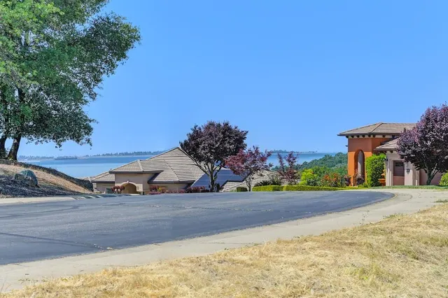 a view of a road with a building in the background