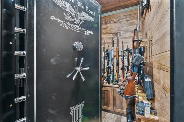a white bath tub sitting in a bathroom next to a sink