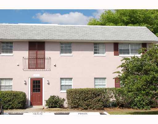 525 South Conway Road, Unit 132 Orlando, FL 32807 - Photo 1 of 1 a aerial view of a house with a yard and plants
