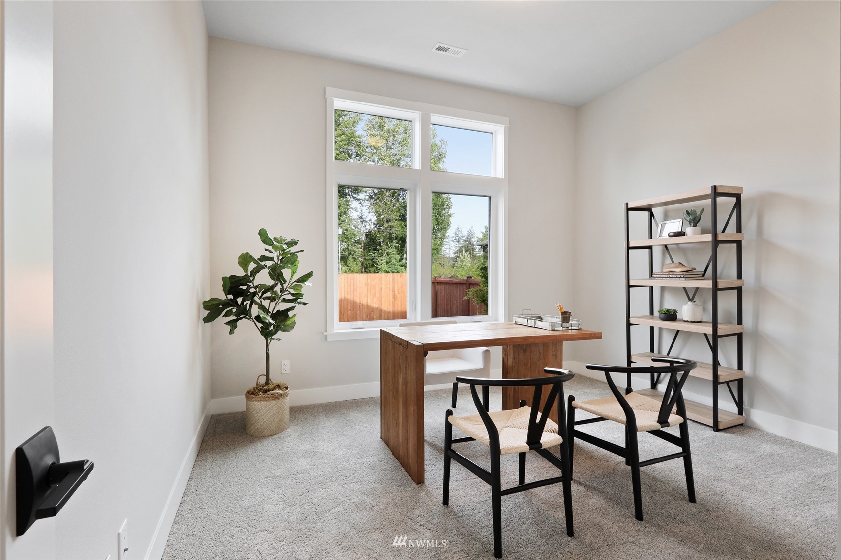 1228 197th Place Southeast Bothell, WA 98012 - Photo 13 of 34 a view of a dining room with furniture and window
