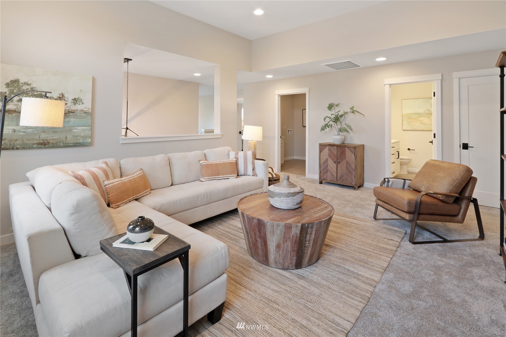1228 197th Place Southeast Bothell, WA 98012 - Photo 16 of 34 a living room with furniture and a wooden floor