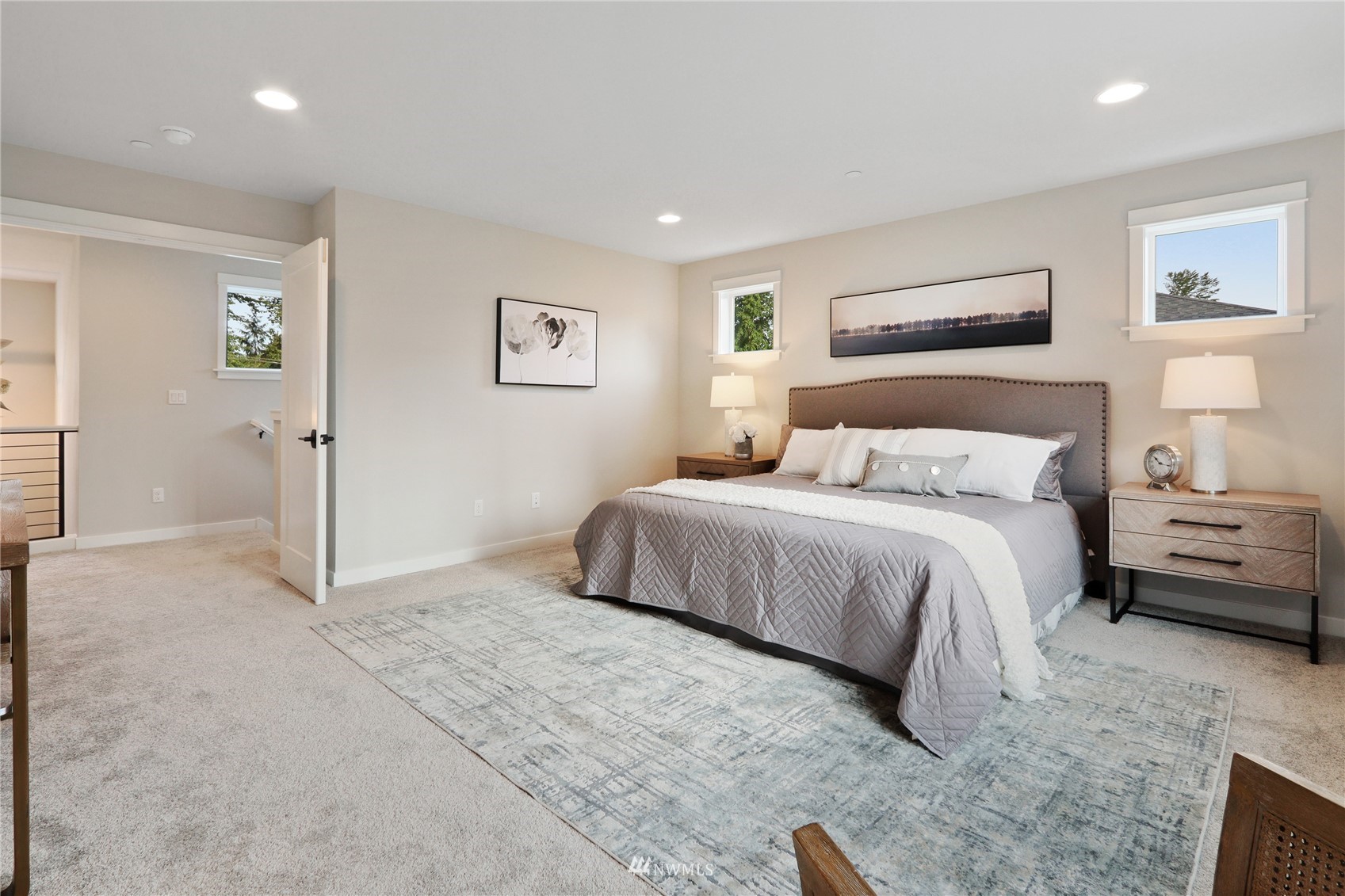 1228 197th Place Southeast Bothell, WA 98012 - Photo 18 of 34 a bedroom with a bed and a painting