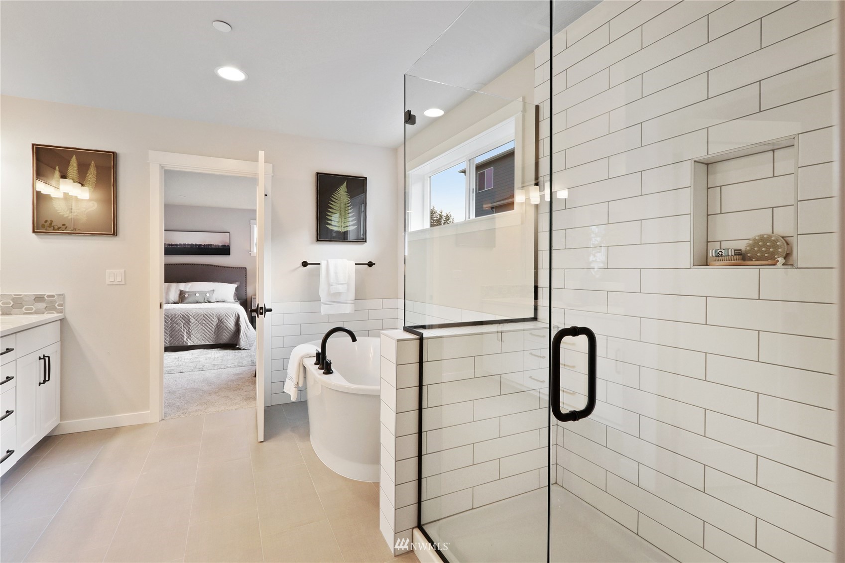 1228 197th Place Southeast Bothell, WA 98012 - Photo 21 of 34 a en suite bathroom with a shower and mirror